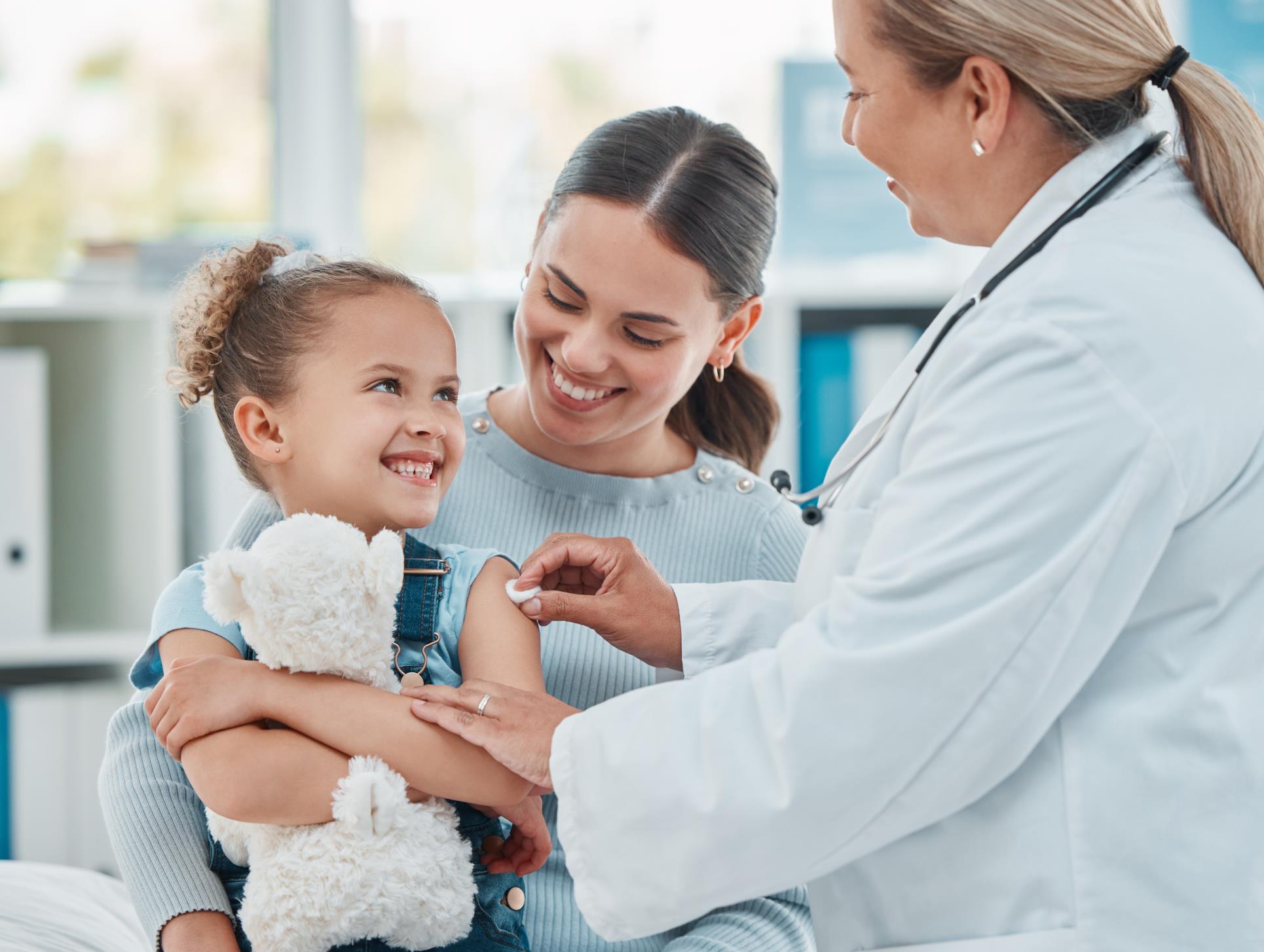 Child receive her school children vaccination