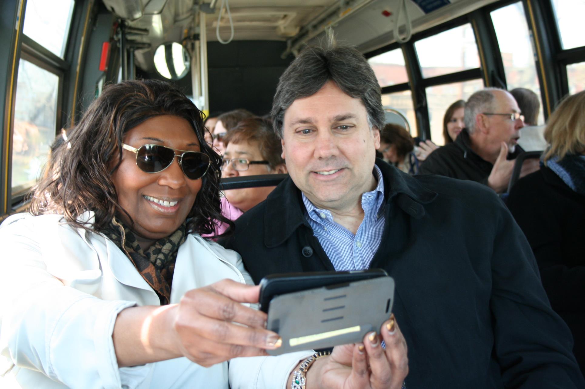 Members of the Class of 2014 take a selfie on the bus